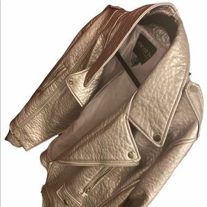 selling this beautiful leather jacket. Never wear